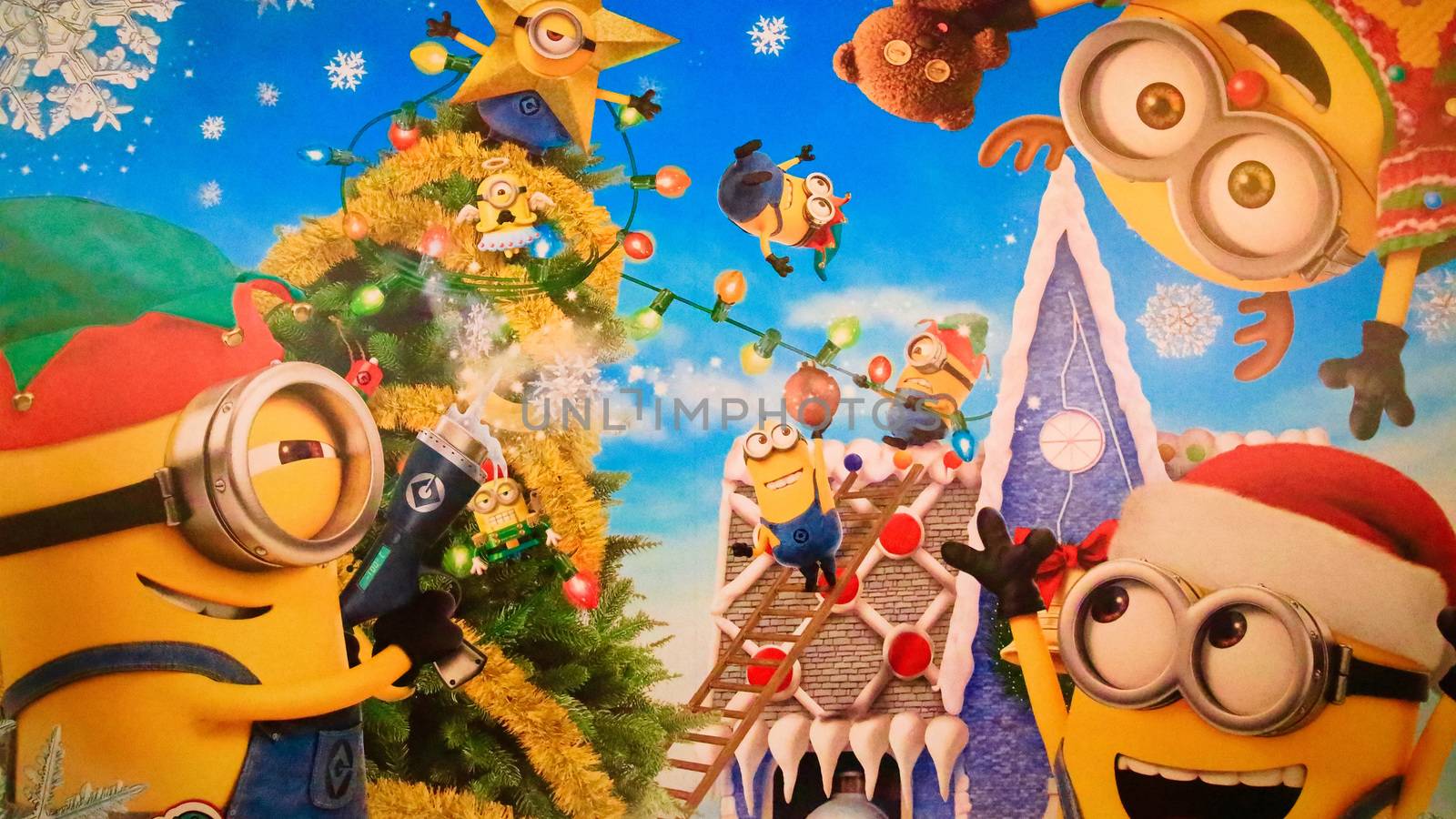 OSAKA, JAPAN - Nov 13, 2019 : Close up of Christmas Happy holiday version of HAPPY MINION statue in Universal Studios Japan. Minions are famous character from Despicable Me animation. by USA-TARO