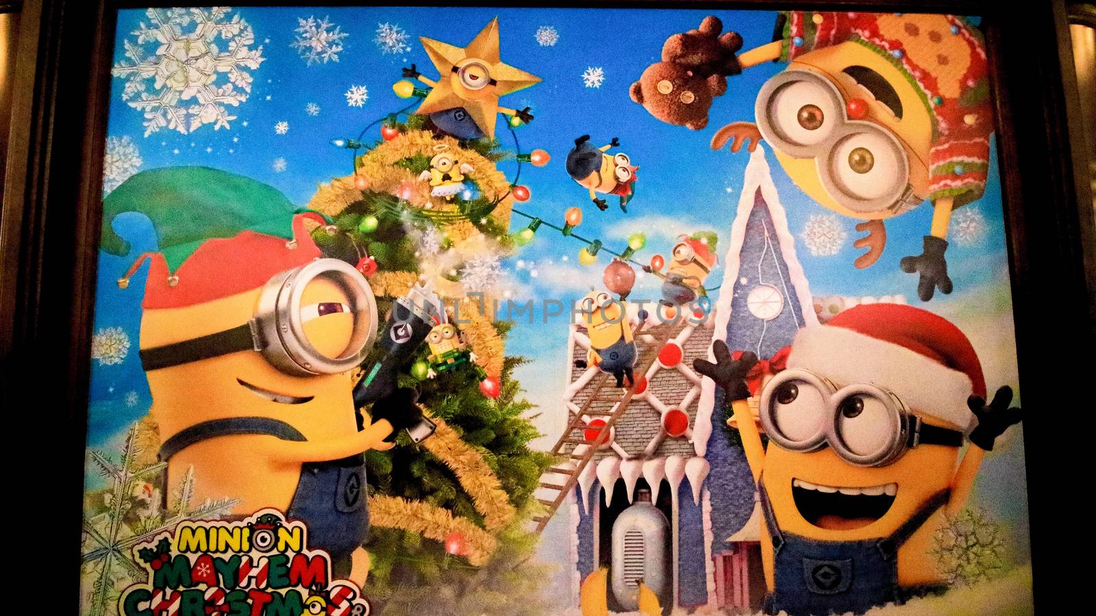 OSAKA, JAPAN - Nov 13, 2019 : Close up of Christmas Happy holiday version of HAPPY MINION statue in Universal Studios Japan. Minions are famous character from Despicable Me animation.