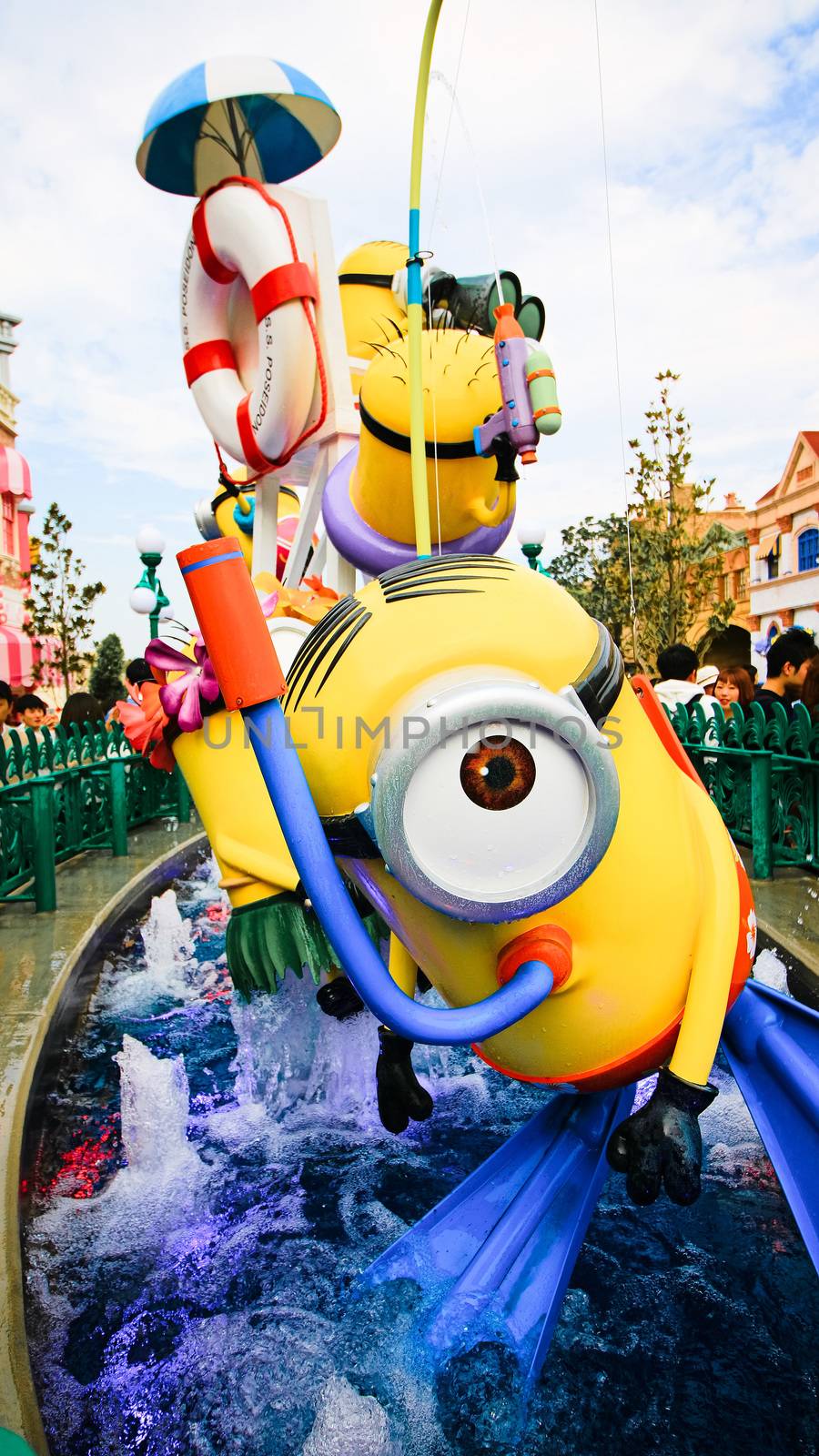 OSAKA, JAPAN - November 03, 2017 : Statue of MINIONS at MINION PARK ENTRANCE in Universal Studios JAPAN.  Minions are famous characters from Despicable Me animation. by USA-TARO