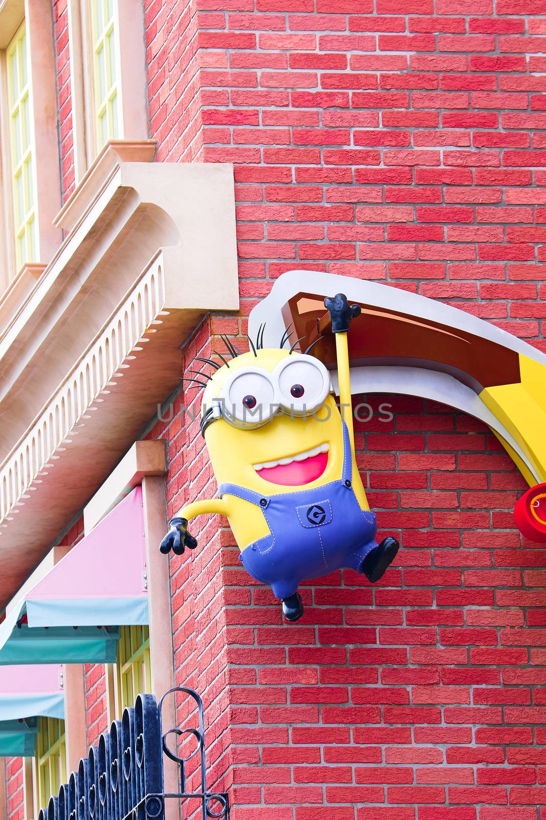 OSAKA, JAPAN - Feb 29, 2020 : Close up of HAPPY MINION statue, located in Universal Studios Japan. Minions are famous character from Despicable Me animation.