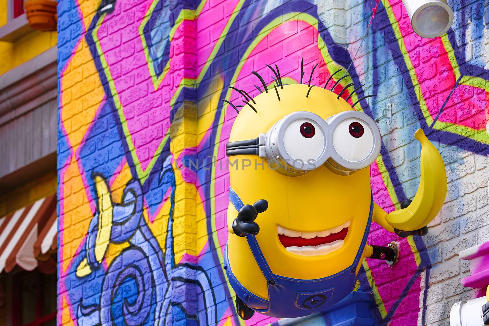 OSAKA, JAPAN - Feb 29, 2020 : Close up of HAPPY MINION statue, located in Universal Studios Japan. Minions are famous character from Despicable Me animation.