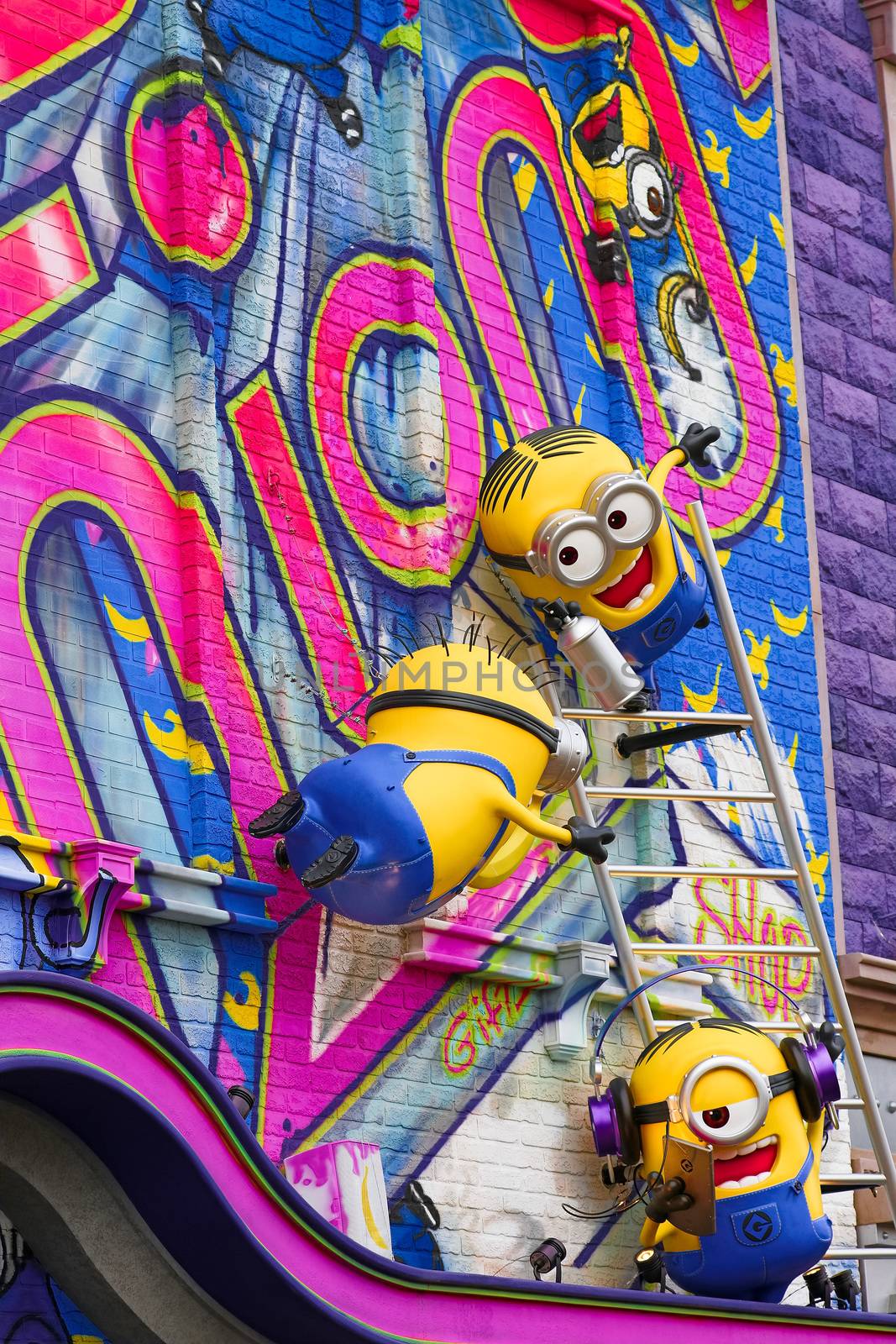 OSAKA, JAPAN - Feb 29, 2020 : Close up of HAPPY MINION statue, located in Universal Studios Japan. Minions are famous character from Despicable Me animation. by USA-TARO