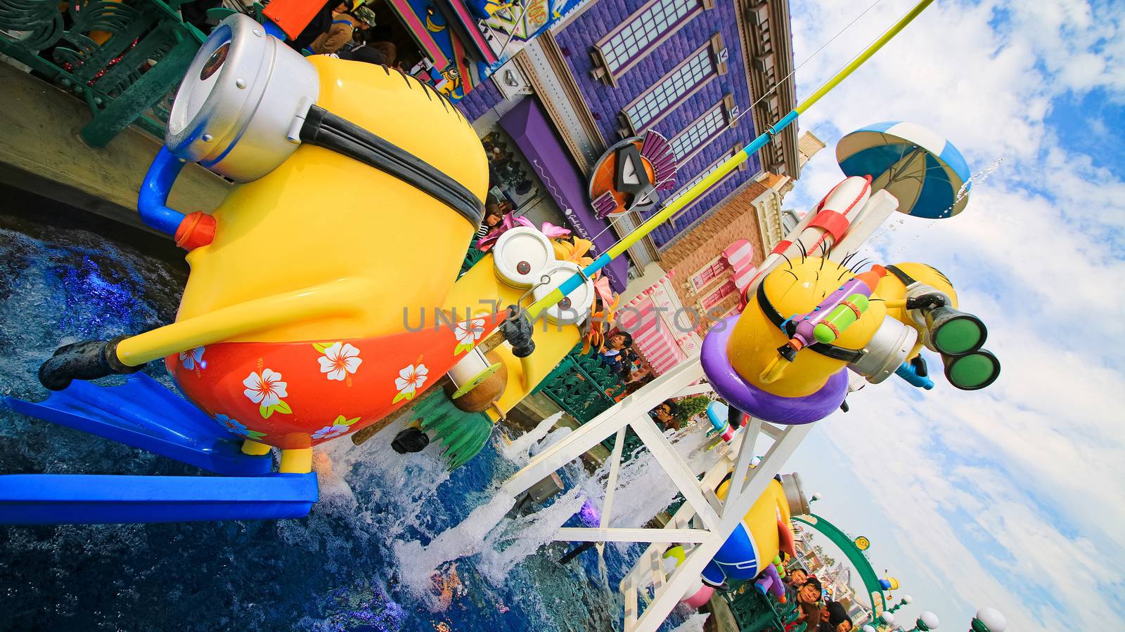 OSAKA, JAPAN - November 03, 2017 : Statue of MINIONS at MINION PARK ENTRANCE in Universal Studios JAPAN.  Minions are famous characters from Despicable Me animation.