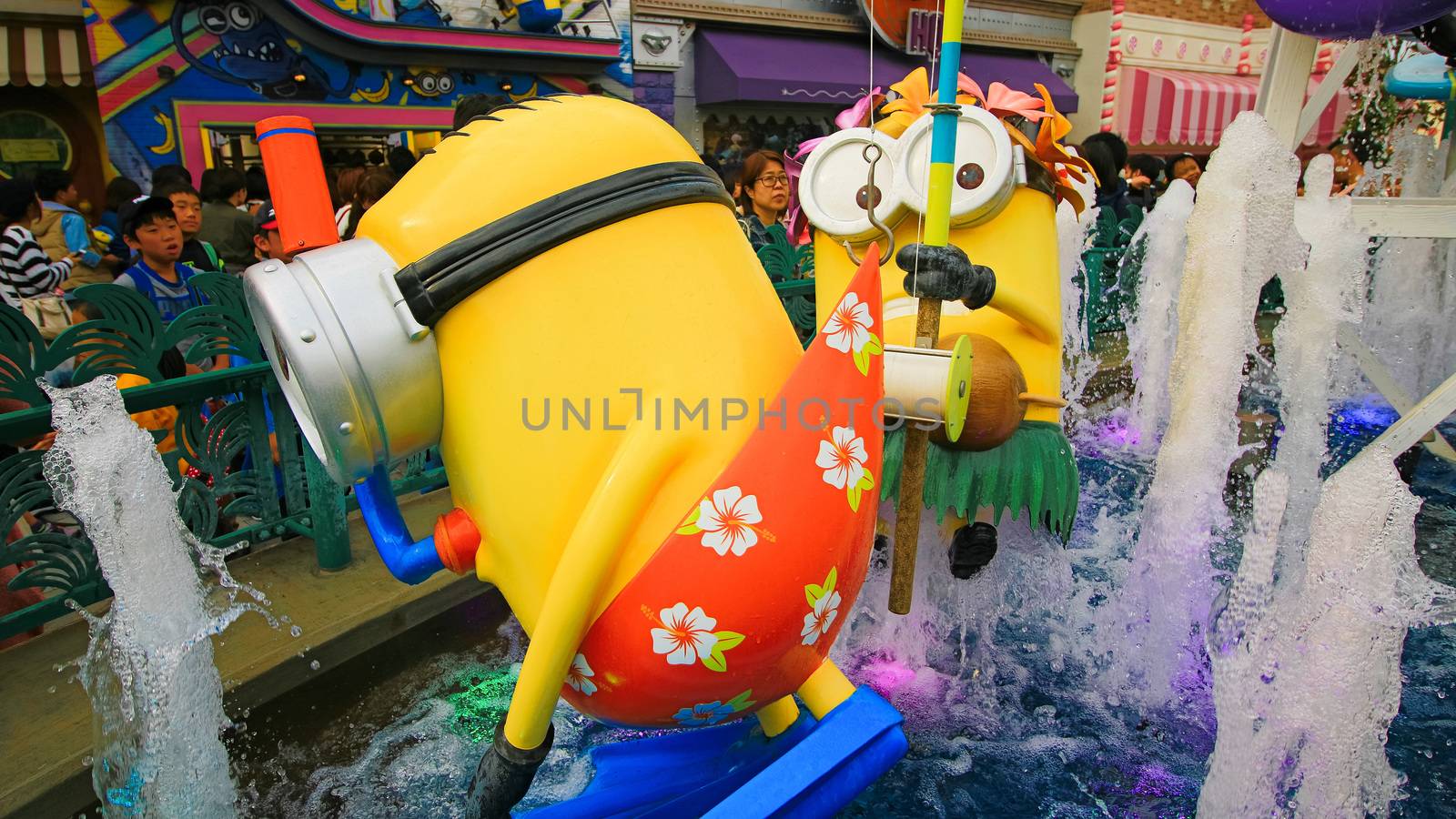 OSAKA, JAPAN - November 03, 2017 : Statue of MINIONS at MINION PARK ENTRANCE in Universal Studios JAPAN.  Minions are famous characters from Despicable Me animation. by USA-TARO