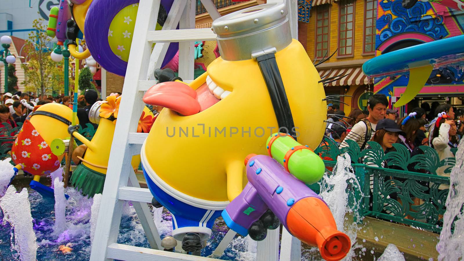 OSAKA, JAPAN - November 03, 2017 : Statue of MINIONS at MINION PARK ENTRANCE in Universal Studios JAPAN.  Minions are famous characters from Despicable Me animation.