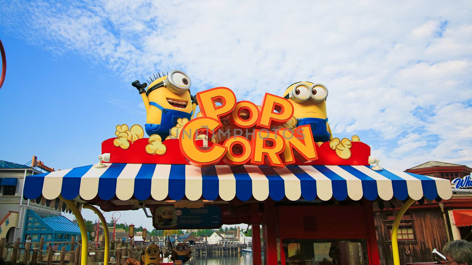 OSAKA, JAPAN - JAN 07, 2017 : Photo of "HAPPY MINION POP CORN SHOP", selling Minion Pop Corn, located in Universal Studios, Osaka, Japan. Minions are famous character from Despicable Me animation. by USA-TARO