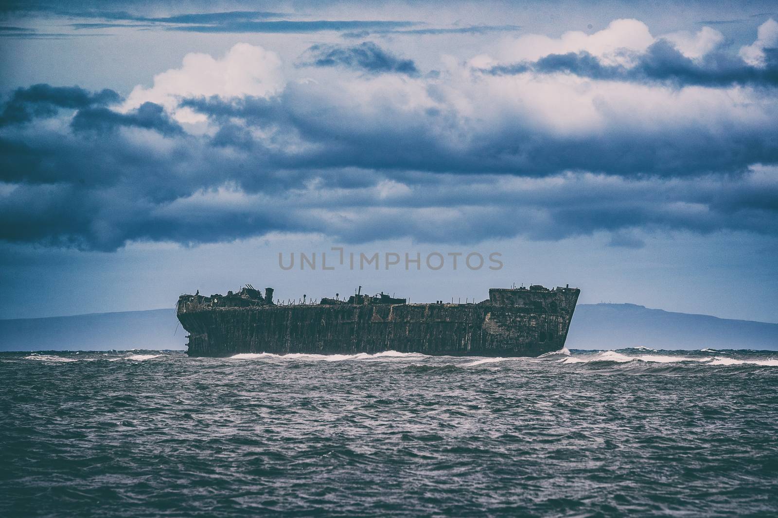 Shipwreck Beach in Lanai island, Hawaii, USA travel. Old ship wreck in the ocean by Maridav