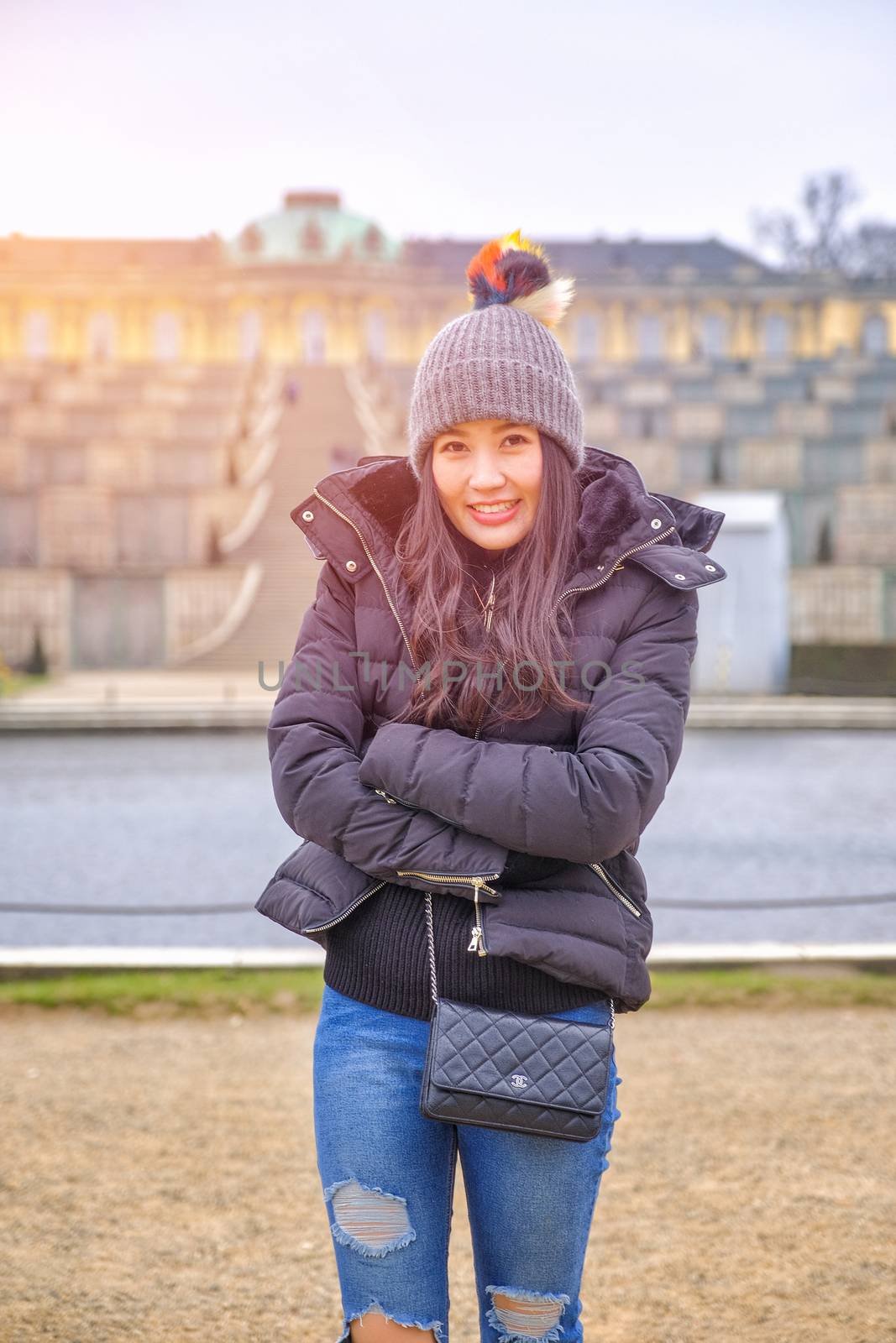 Young female tourist in Sans Souci palace in Potsdam, Berlin, Germany, Europe.