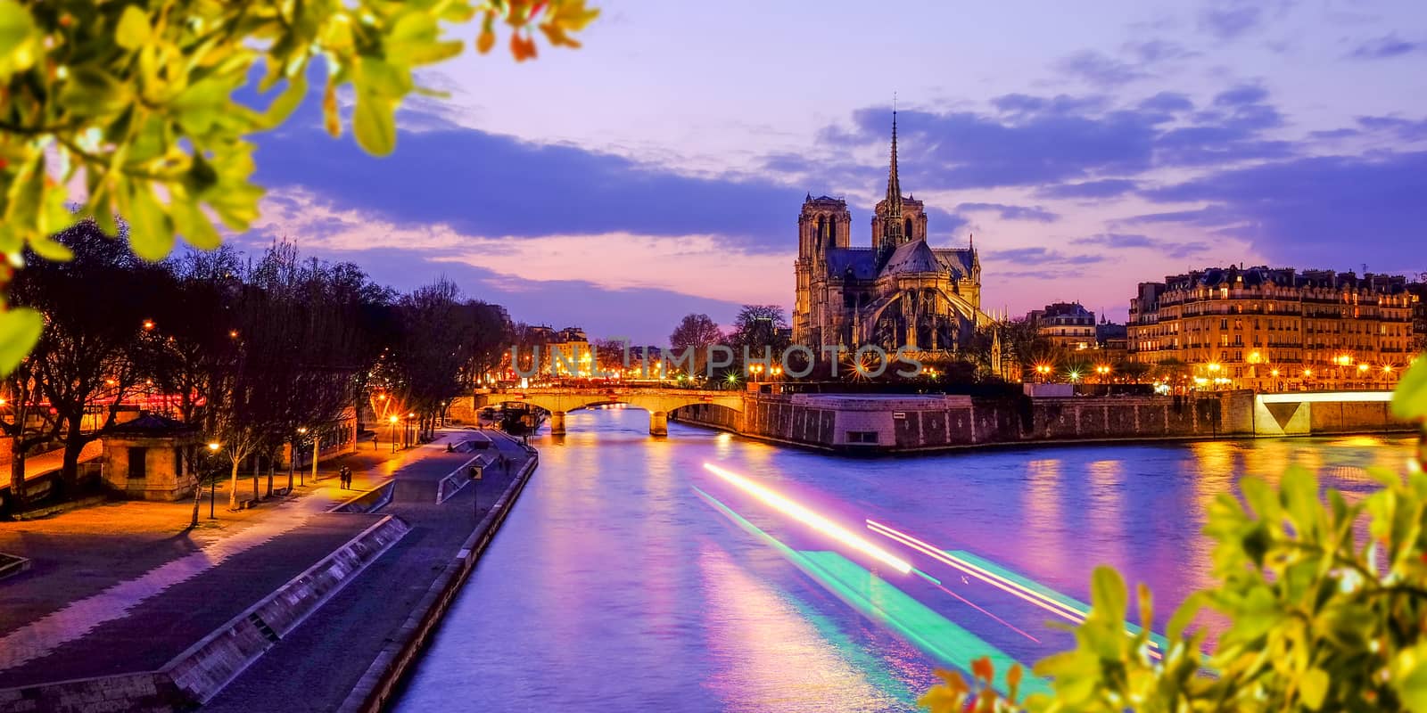 Notre Dame at the river Seine during twilight, Paris, France by Surasak