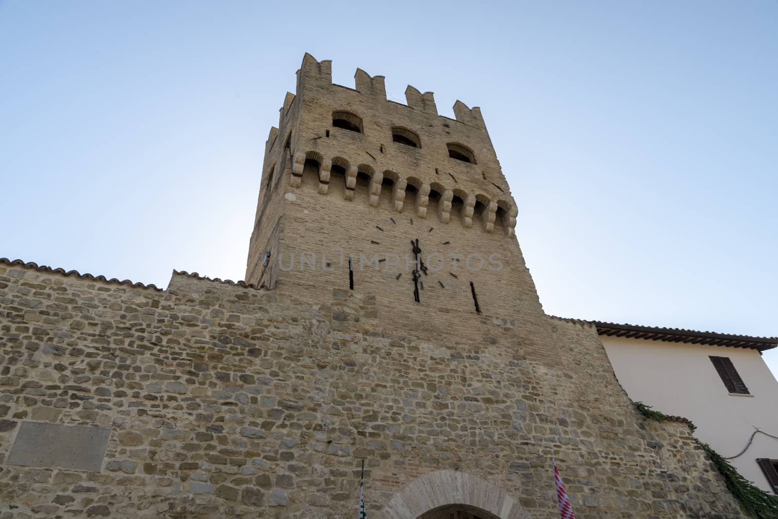 montefalco,italy august 13 2020:tower of Porta which leads to via Corso Goffredo Mameli, municipality of Montefalco