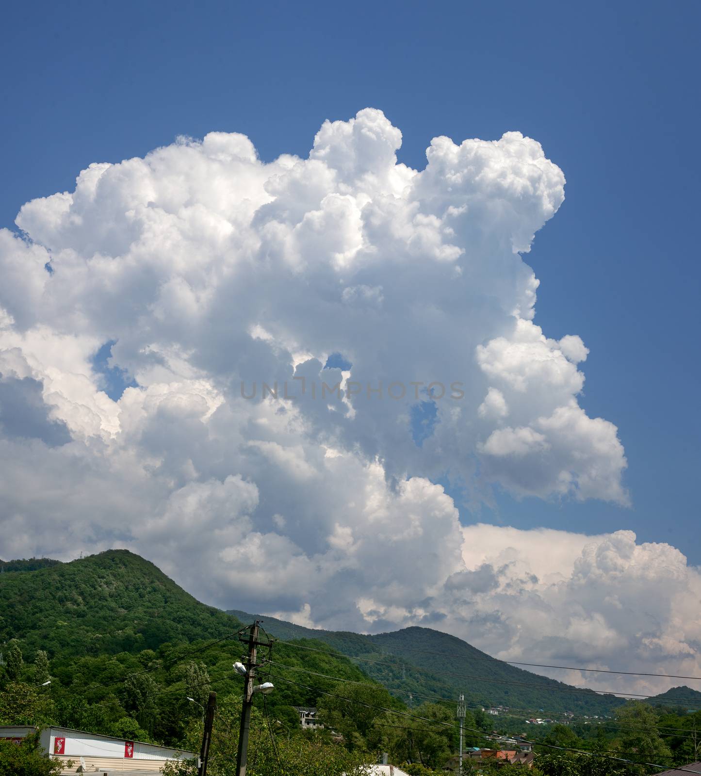 Big cloud above mountains by Angorius