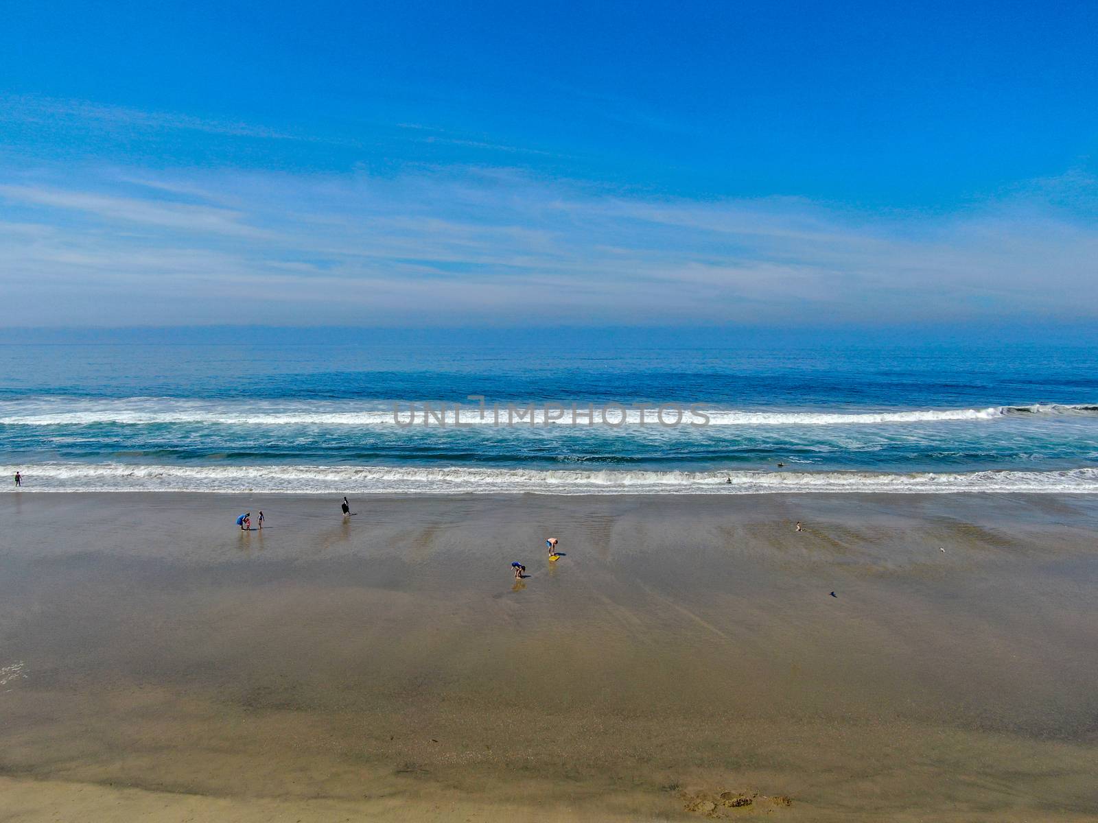 Aerial view of Huntington Beach and coastline during hot blue sunny summer day, Southeast of Los Angeles. California. destination for holiday and surfer