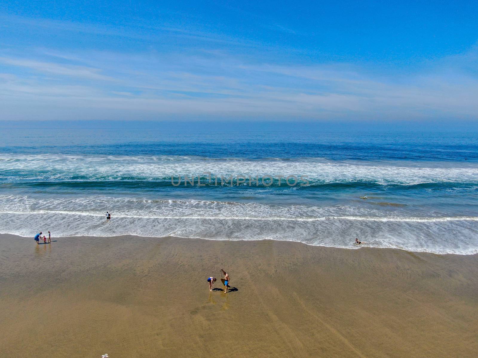 Aerial view of Huntington Beach and coastline during hot blue sunny summer day, Southeast of Los Angeles. California. destination for holiday and surfer