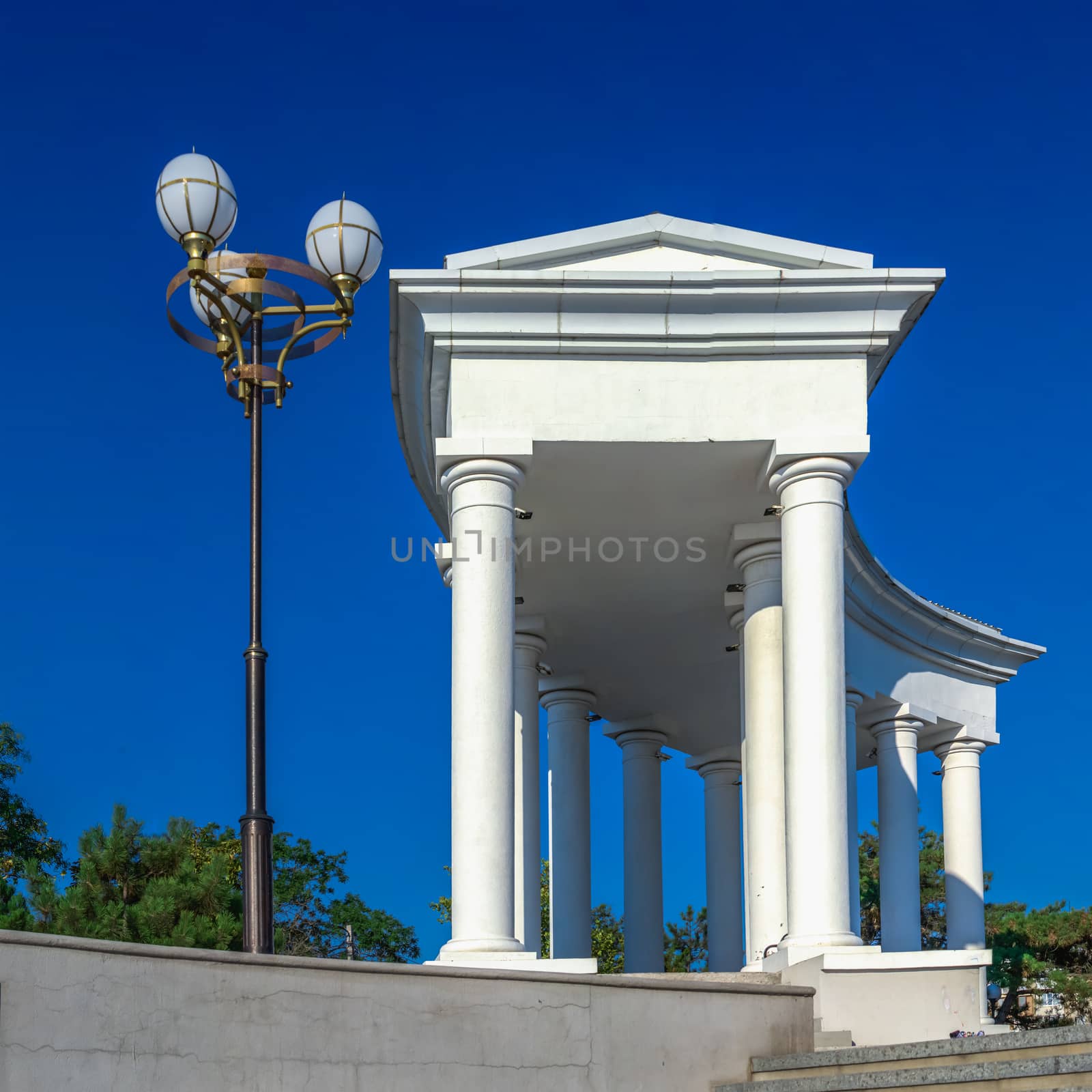 Chernomorsk, Ukraine 08.22.2020. Colonnade  in Chernomorsk city on a sunny summer morning