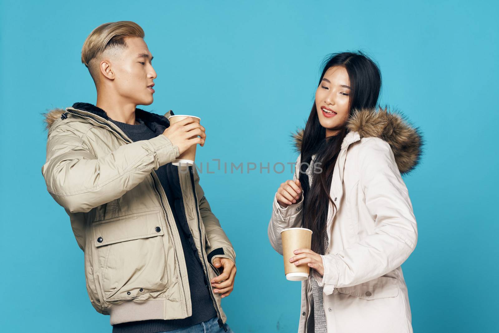 Young couple socializing lifestyle winter studio elegant style fashion lifestyle