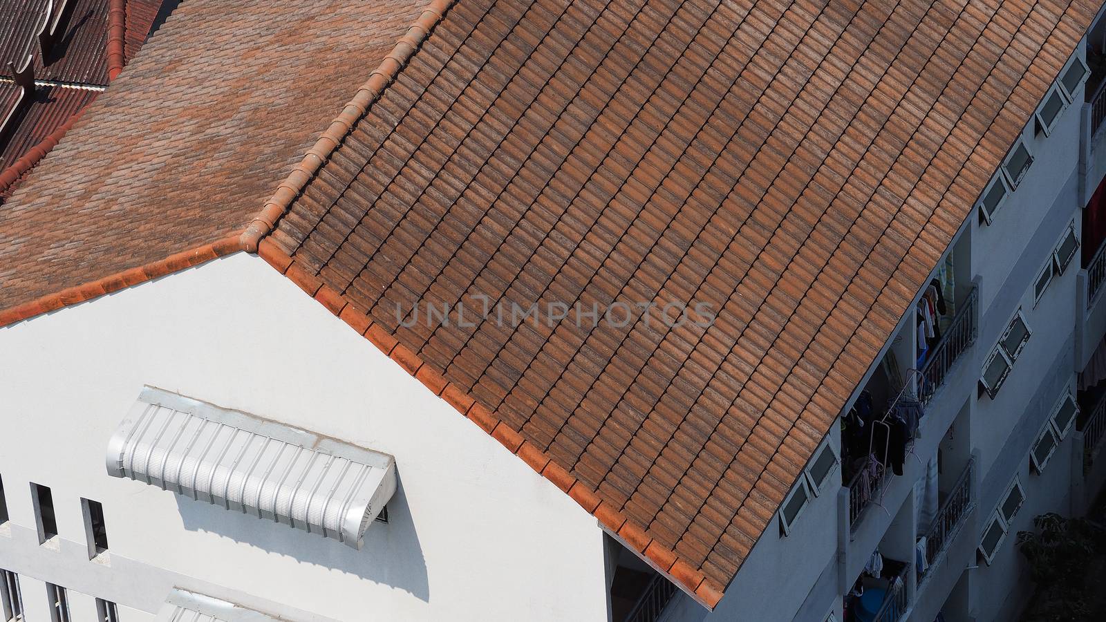 Roof tiles and made from ceramic and metal material and top view angle.