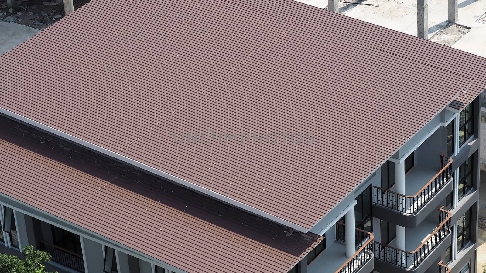 Roof tiles and made from ceramic and metal material and top view angle.