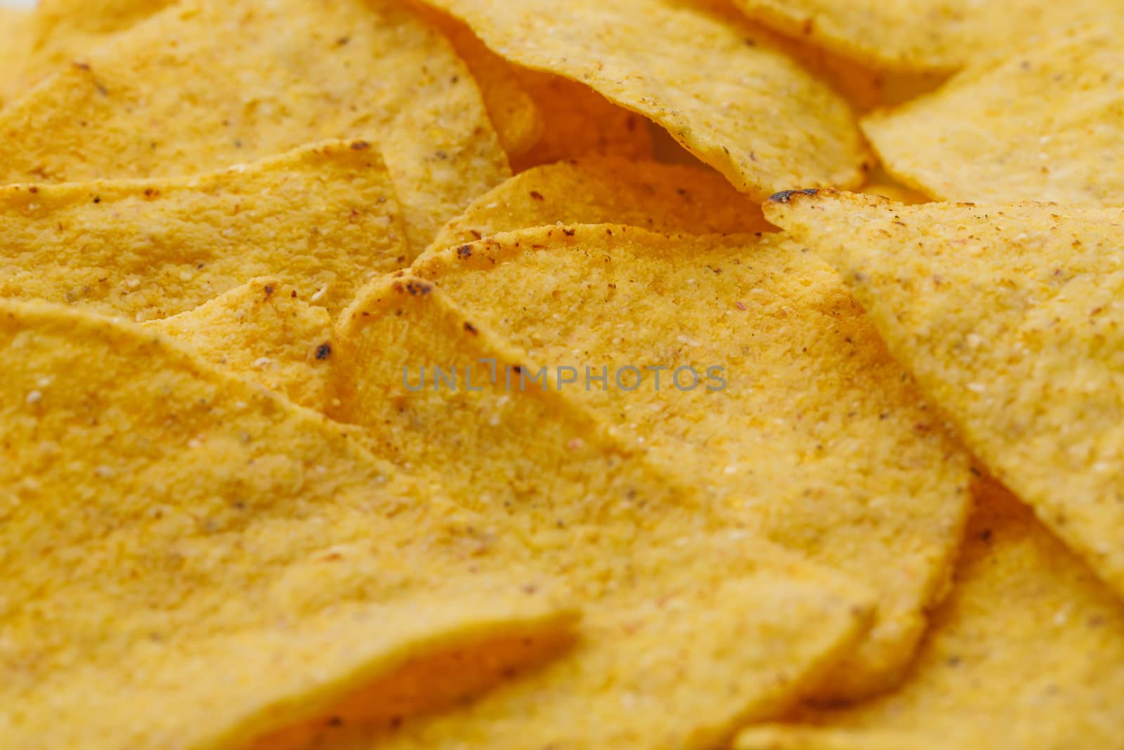 mexican nachos tortilla chips, close-up view by nikkytok