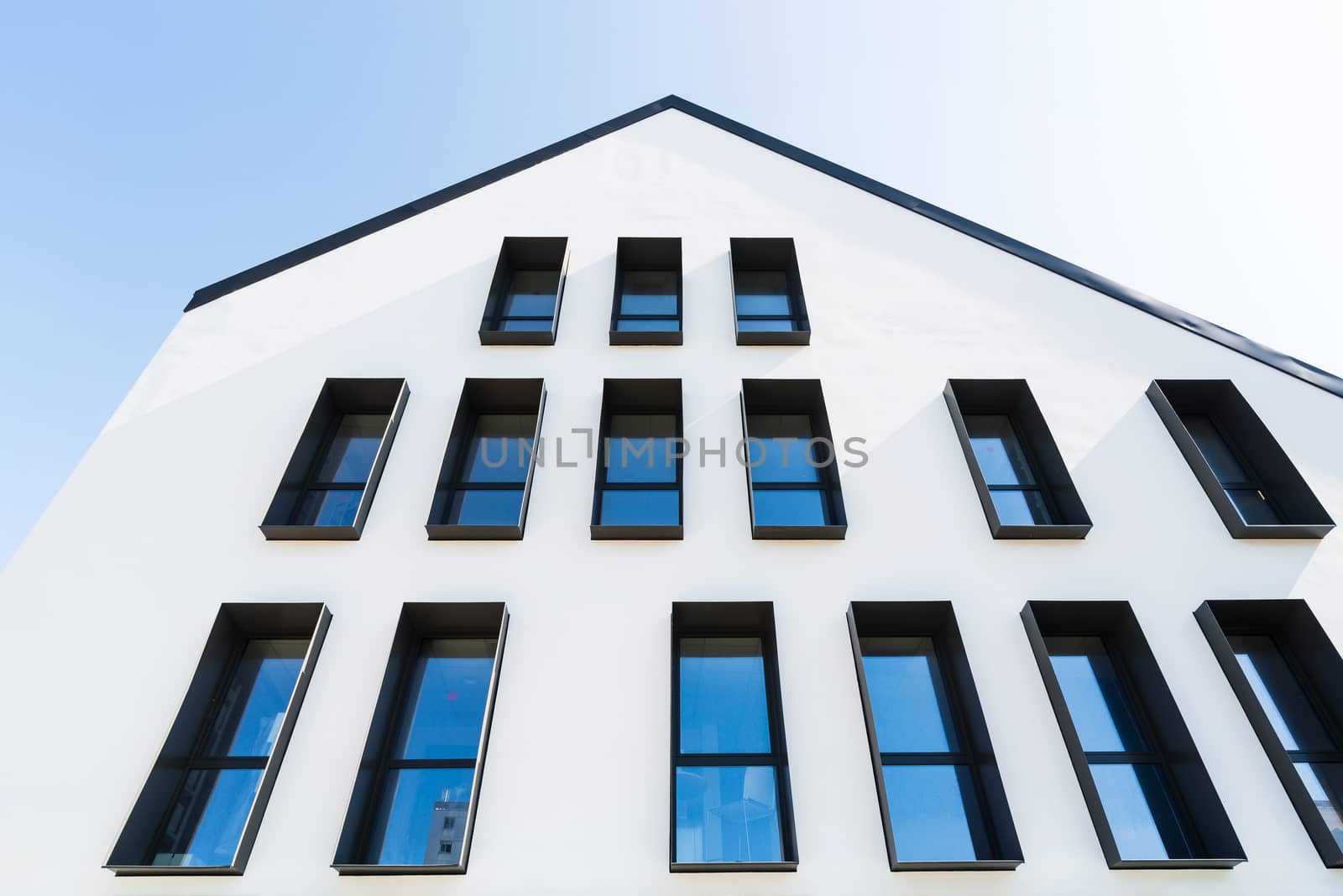 White modern building facade by dutourdumonde