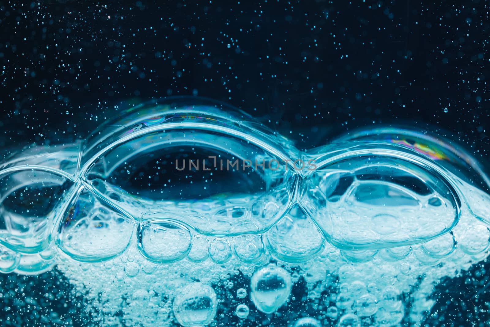 abstract liquid soap bubbles blue background by nikkytok