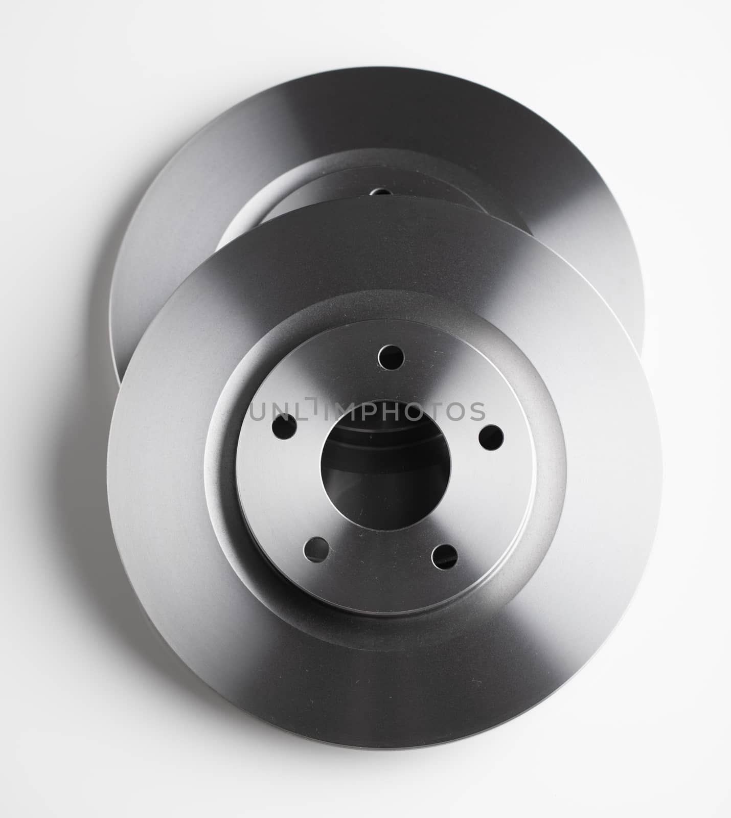 car brake discs on white background by nikkytok