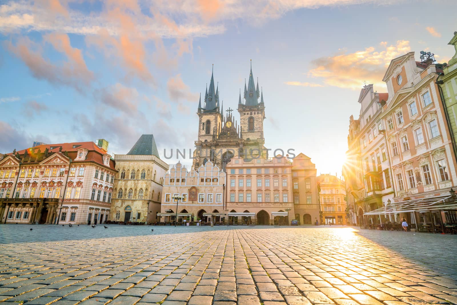 Old Town square with Tyn Church in Prague, Czech Republic at sunset