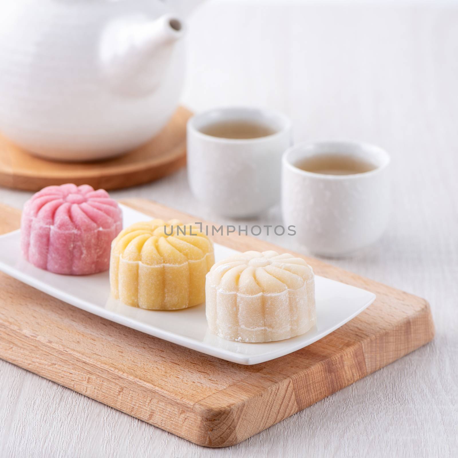 Colorful snow skin moon cake, sweet snowy mooncake, traditional  by ROMIXIMAGE