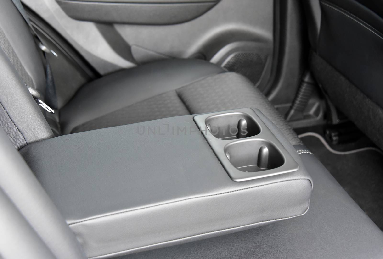 Armrest in the car with cup holder for rear seats row by aselsa