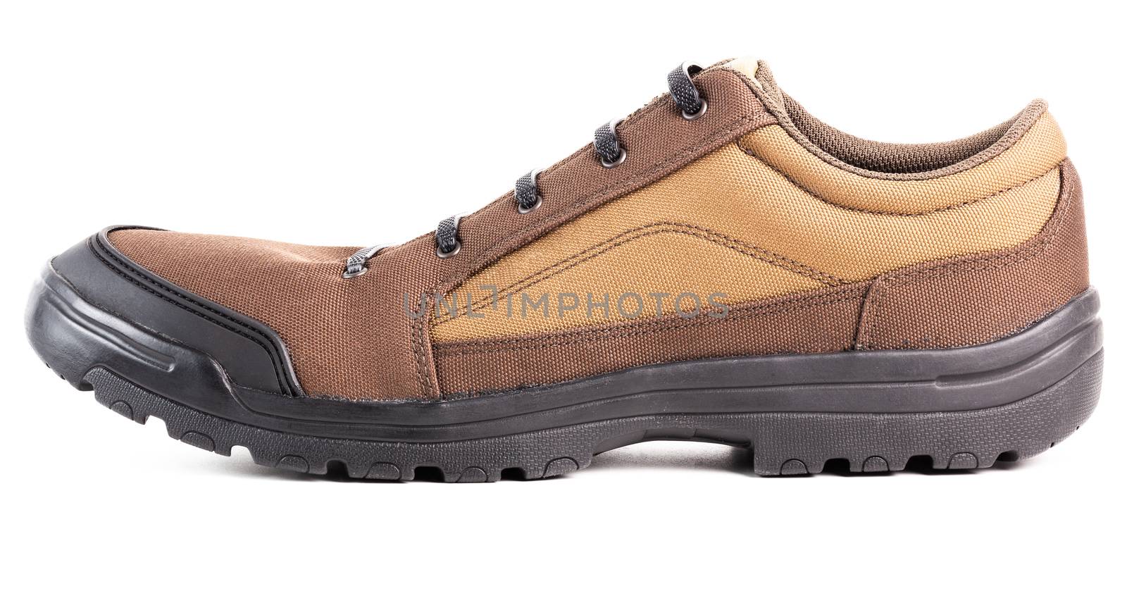 one cheap brown fabric hiking or hunting shoe with elastic rubber laces isolated on white background.