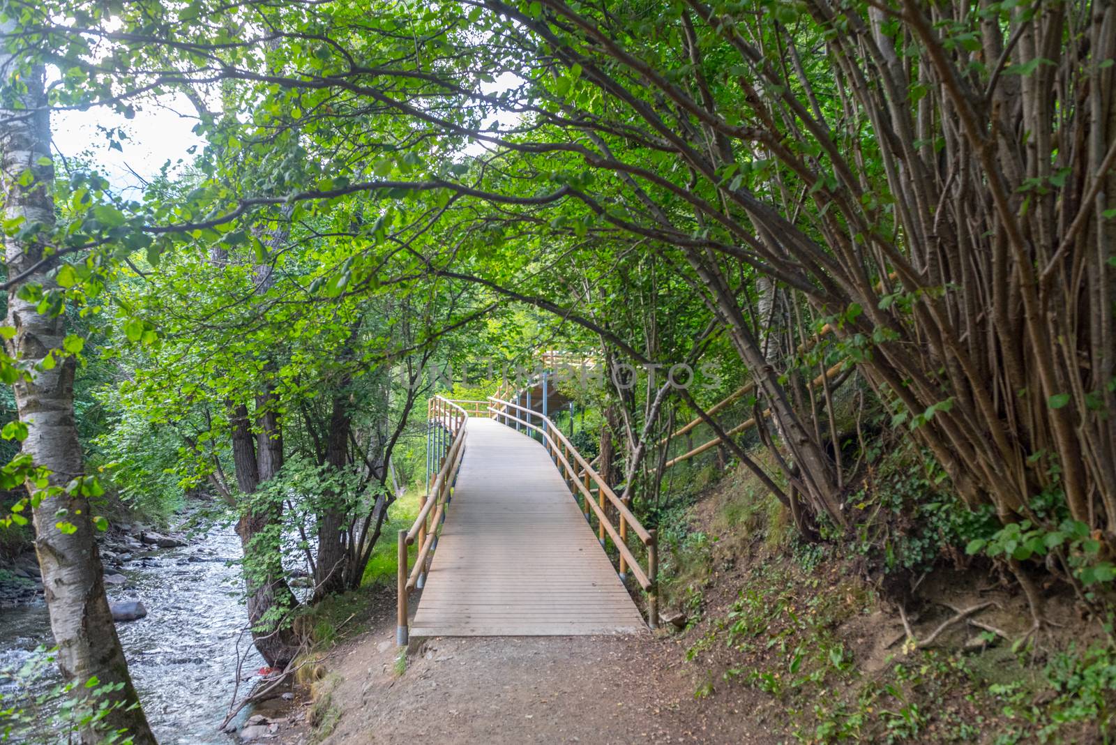 Bridge the Valira del Orient river in Cami Ral in summer in Andorra.