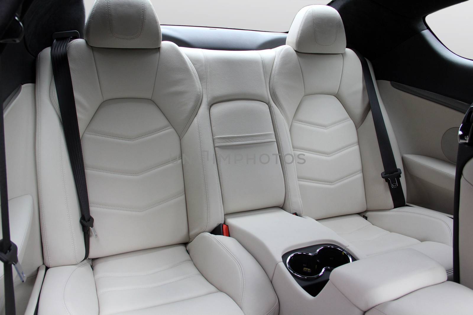 Rear seats covered with fabric in a luxury car