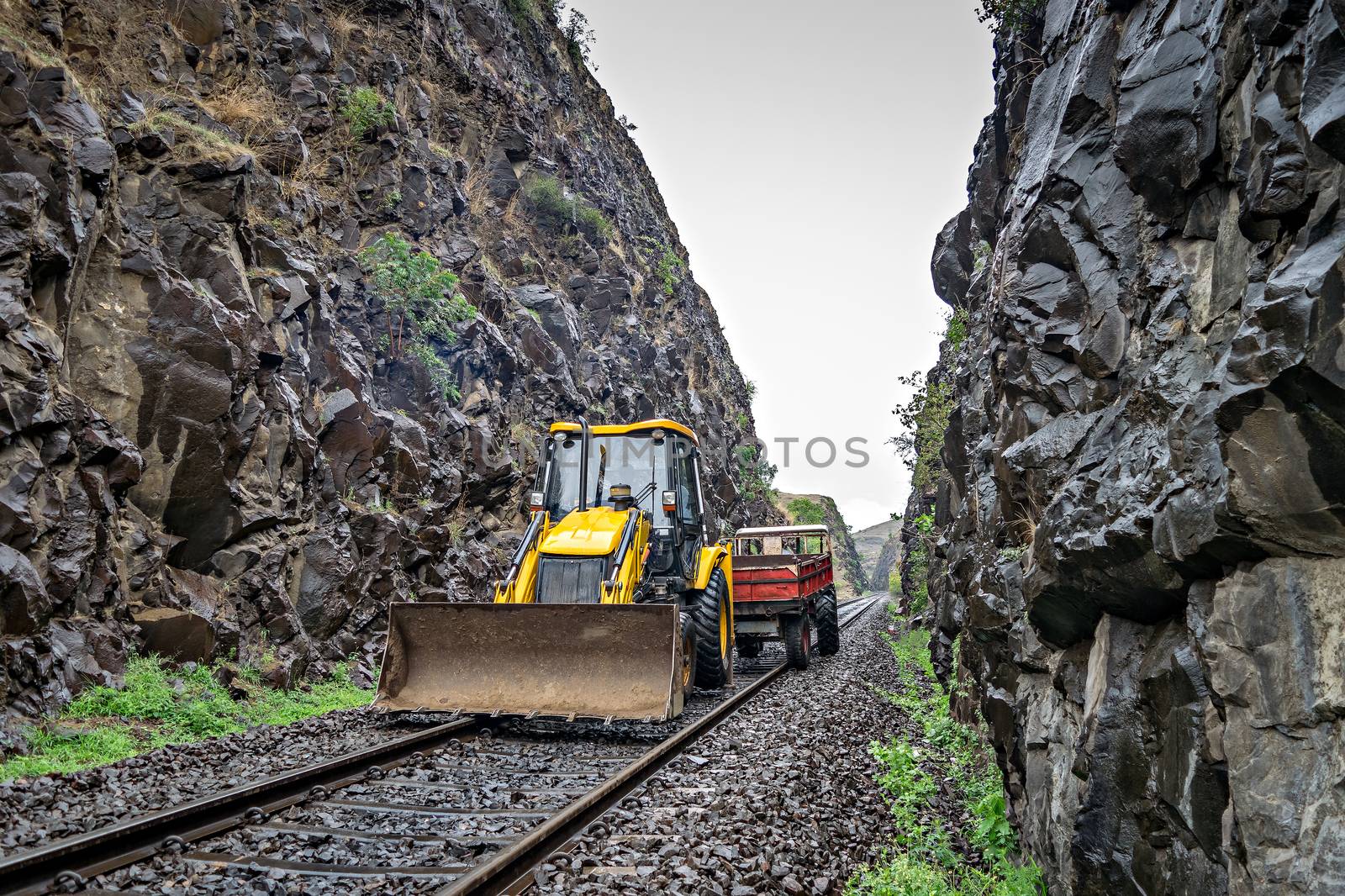 Equipment for removing vulnerable rocks on the side of railway track. by lalam