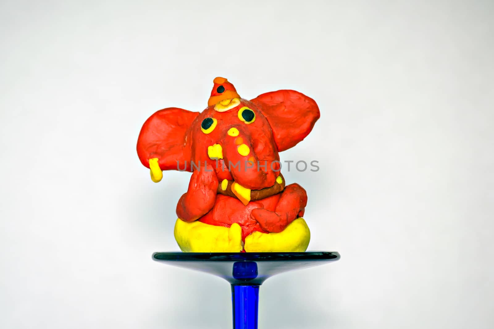 Colorful,home made,clay idol of Lord Ganesha for upcoming Ganesha festival. by lalam