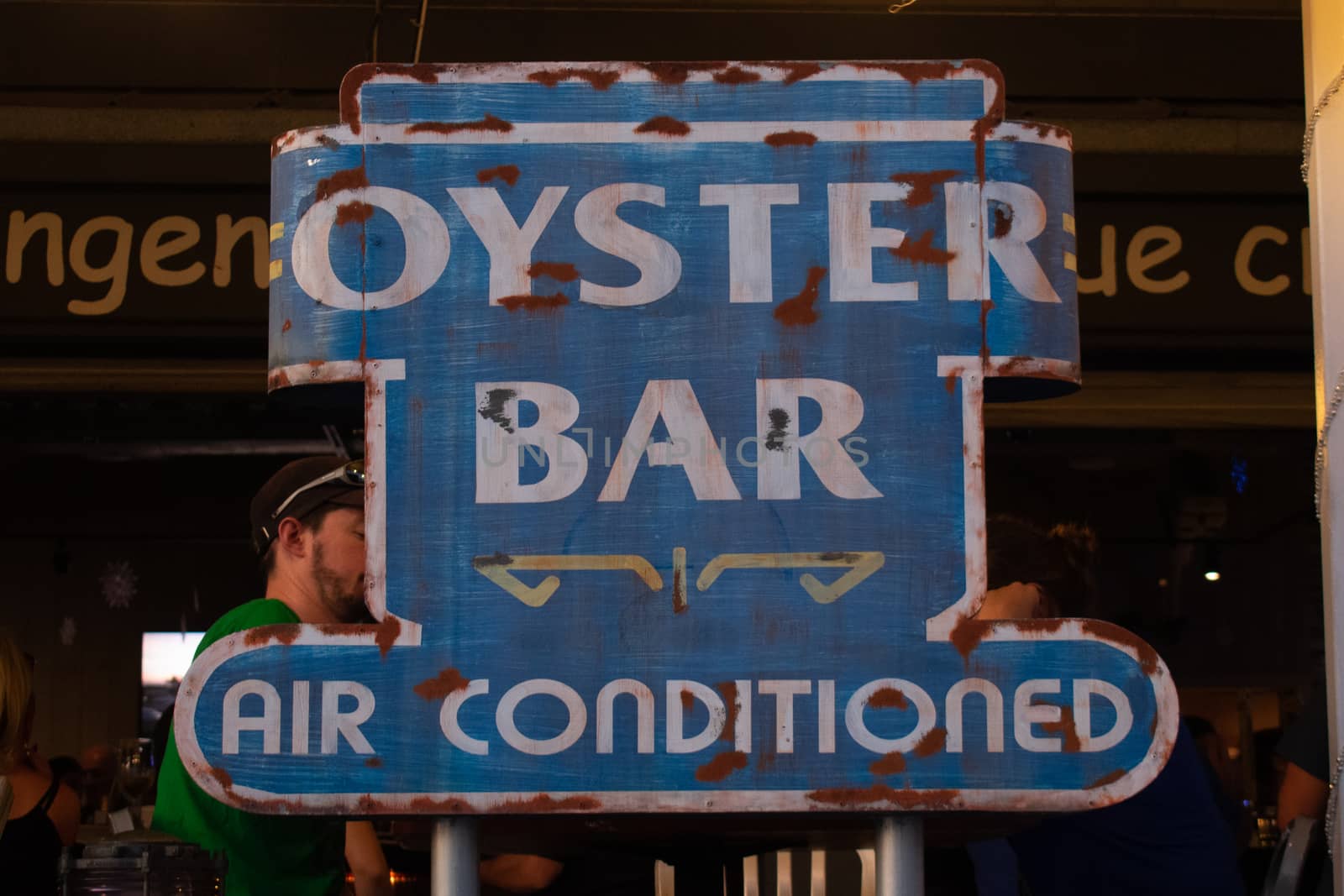 An Old Rusty Oyster Bar Sign at a Restaurant by bju12290