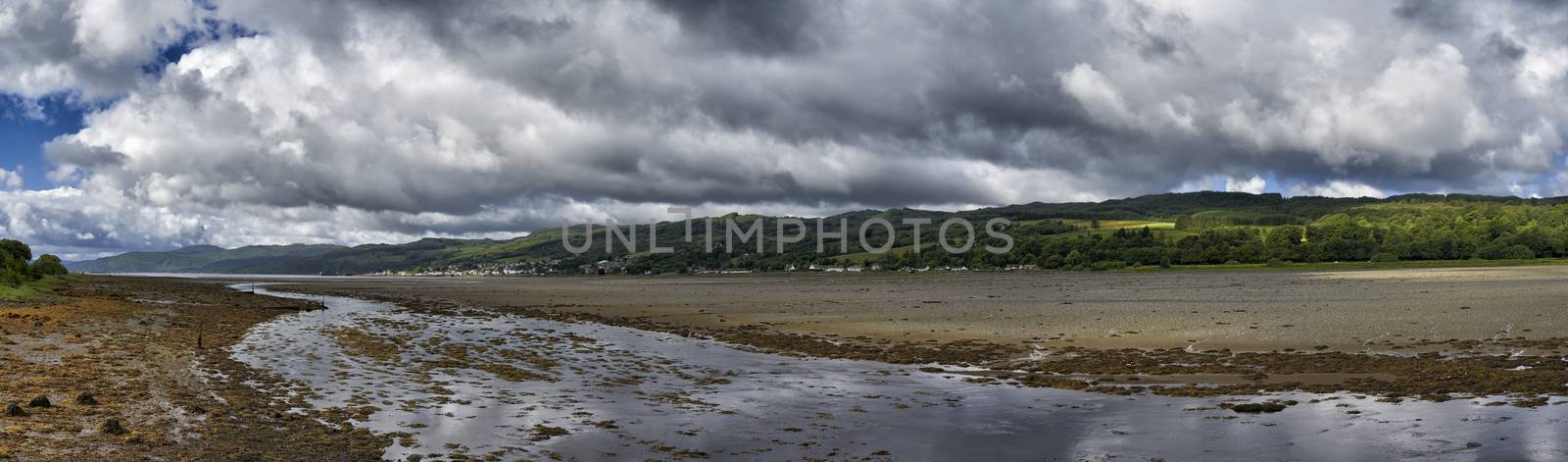 Panoramic view of Lochgilphead estuary at low tide looking out to Loch Gilp in Ayrshire on West coast of Scotland
