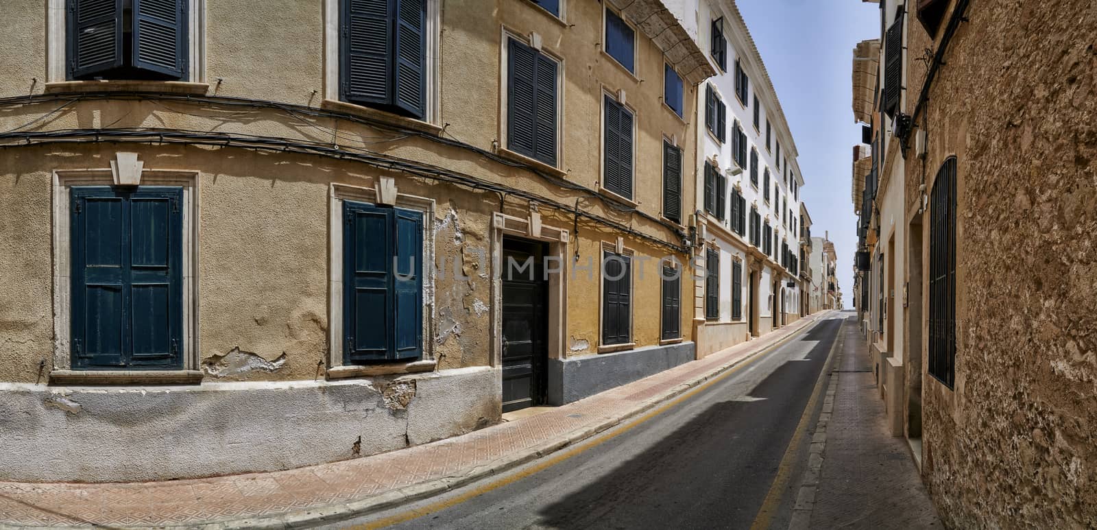 Panoramic view of Traditional Spanish street in city of Mahon, Menorca