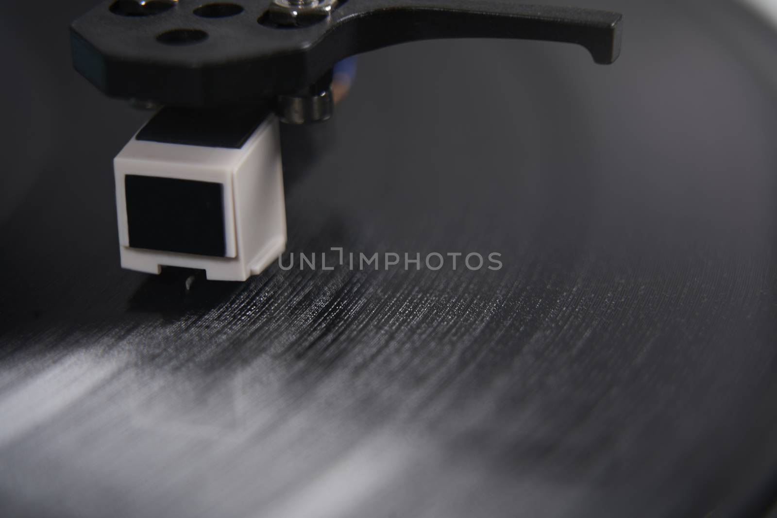 Close Up Of  Record Player Turntable Showing Needle On Vinyl LP