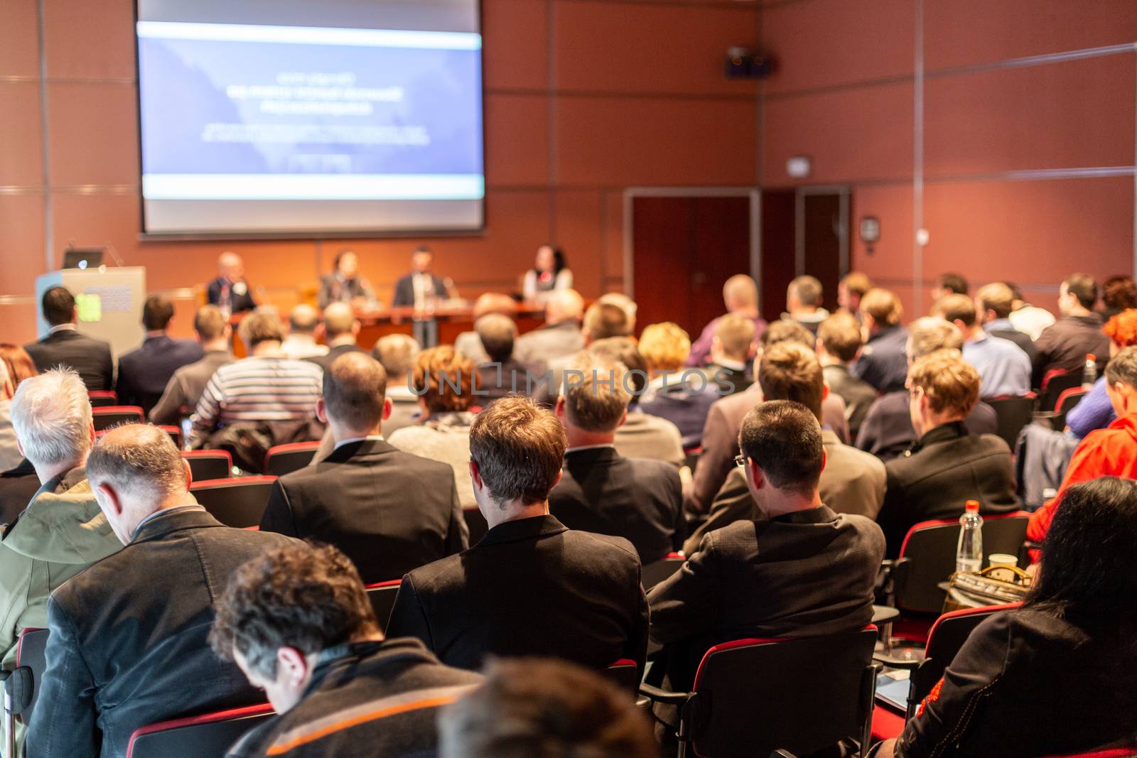 Round table discussion at business convention and presentation. Audience at the conference hall. Business and entrepreneurship symposium.