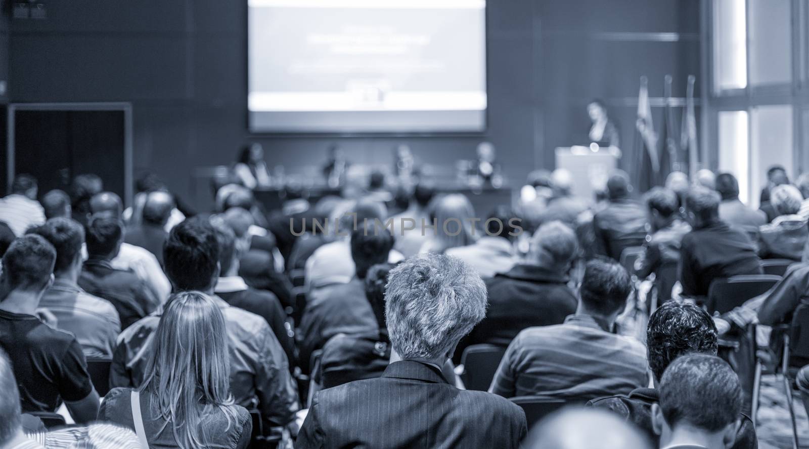 Audience at the conference hall. by kasto