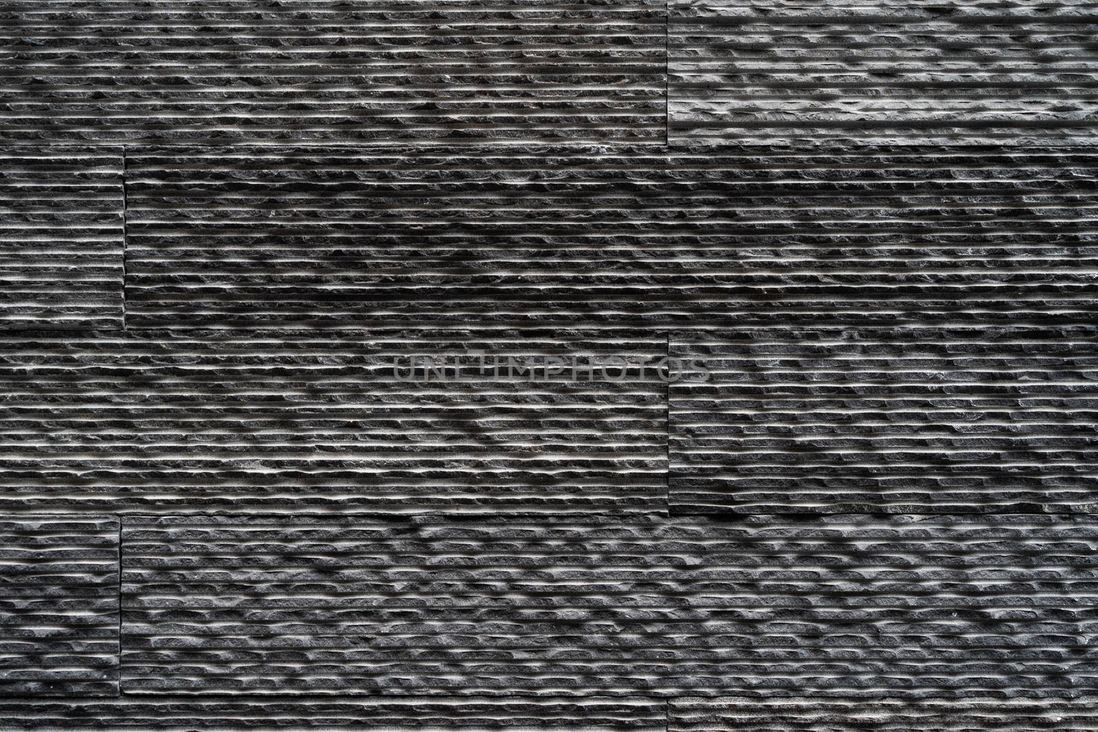 Black bricks slate texture background, slate stone wall texture.