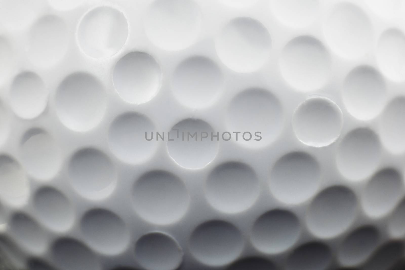 close up view showing dimples on a golf ball