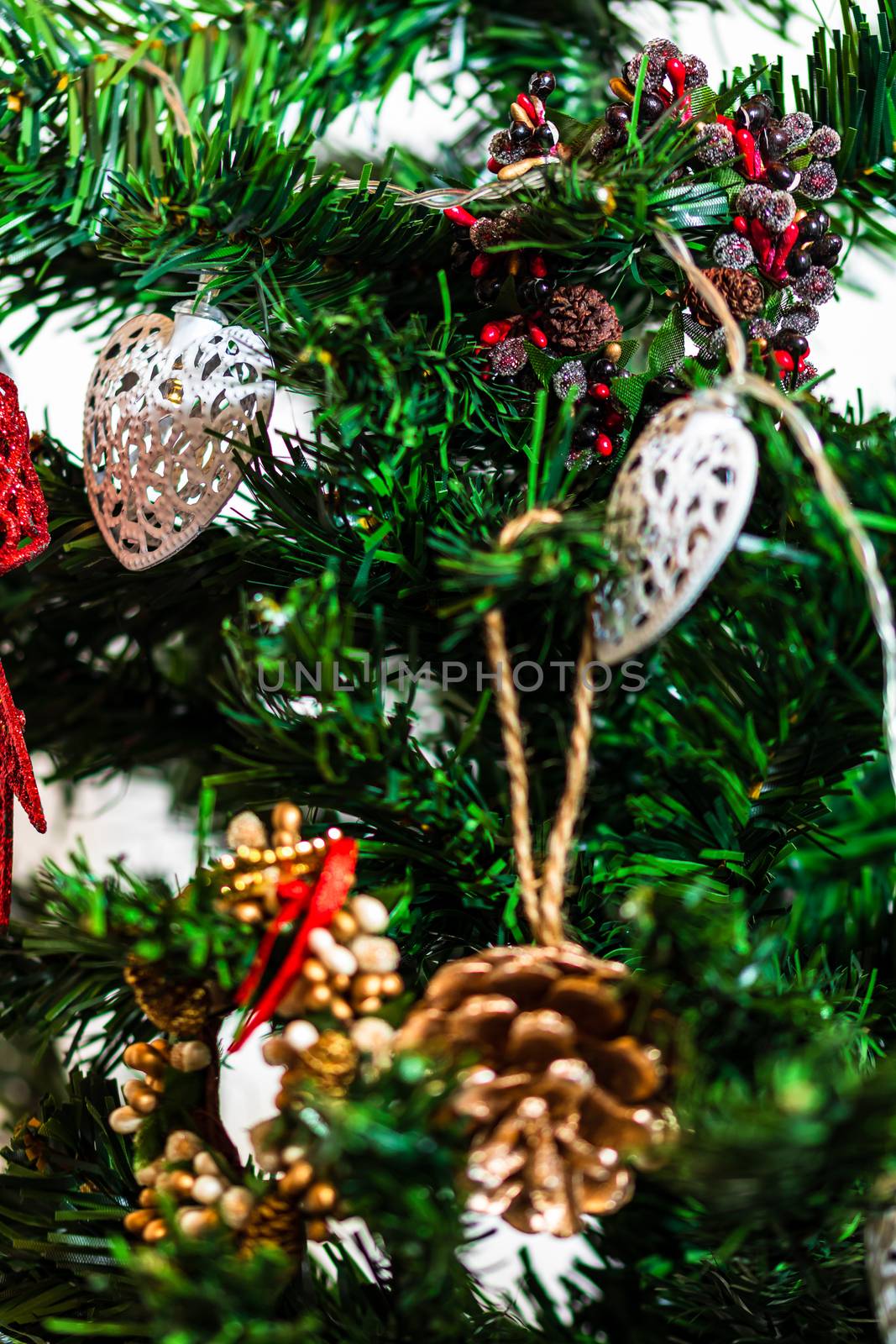 Christmas hanging decorations on fir tree. Decorated Christmas t by vladispas
