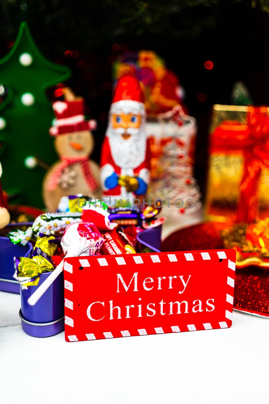 Christmas ornaments decorations and gifts under the  Christmas tree.