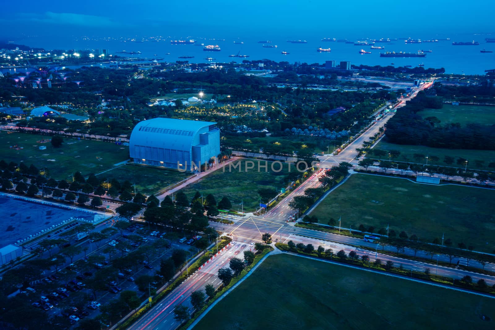 View from Marina Bay towards Straits View and Singapore Strait at night in Singapore