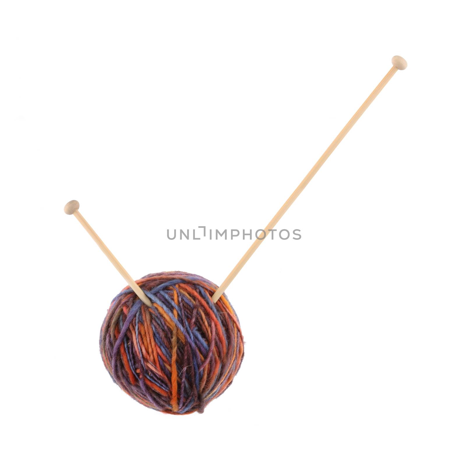 A tick checkmark made from a ball of wool and knitting needles
