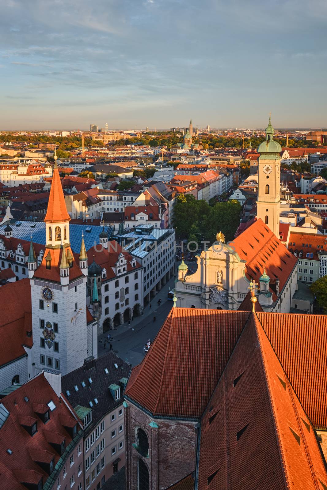 Aerial view of Munich - Marienplatz and Altes Rathaus from St. Peter's church on sunset. Munich, Germany