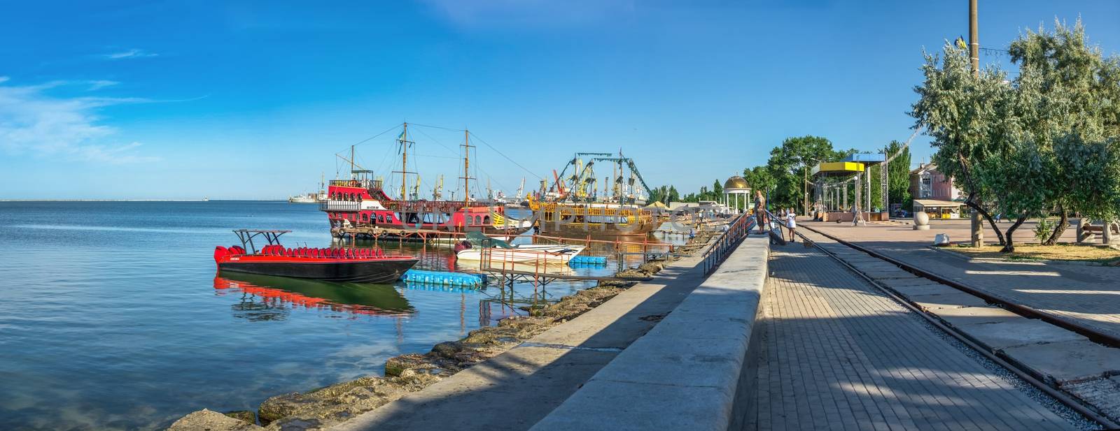 Berdyansk, Ukraine 07.23.2020. Pleasure boats on the embankment of the Azov Sea in Berdyansk, Ukraine, on a summer morning