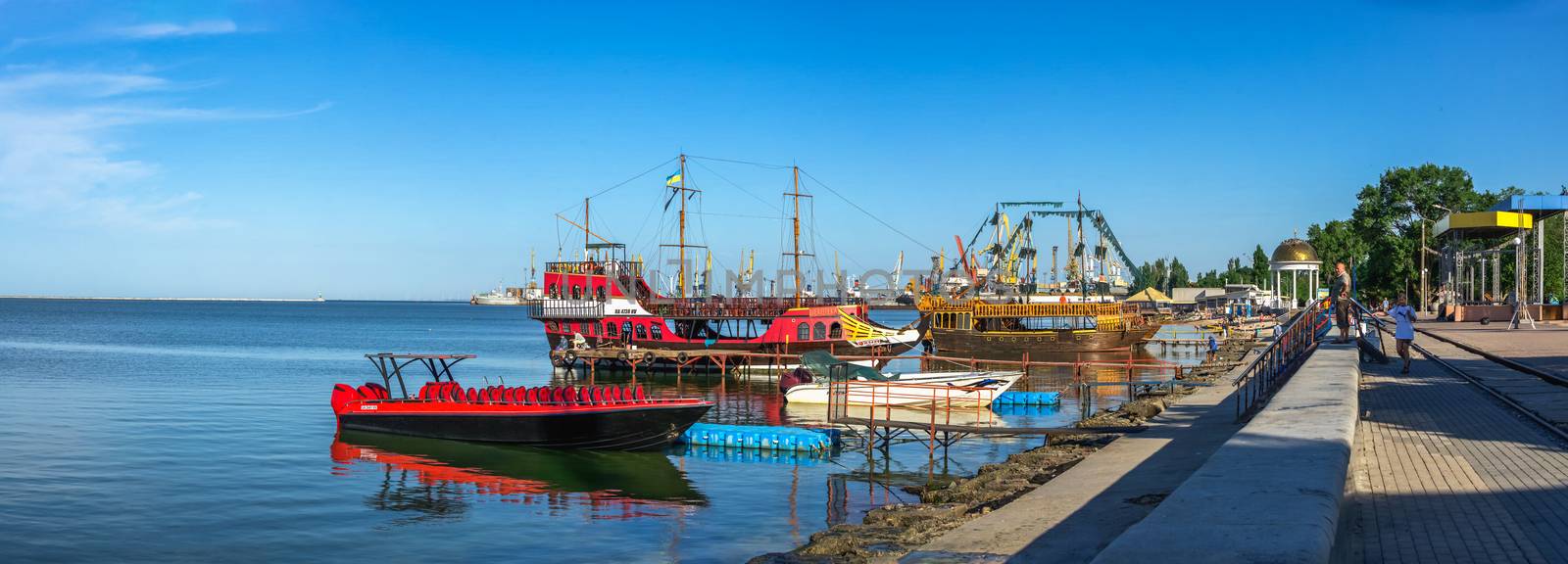 Berdyansk, Ukraine 07.23.2020. Pleasure boats on the embankment of the Azov Sea in Berdyansk, Ukraine, on a summer morning