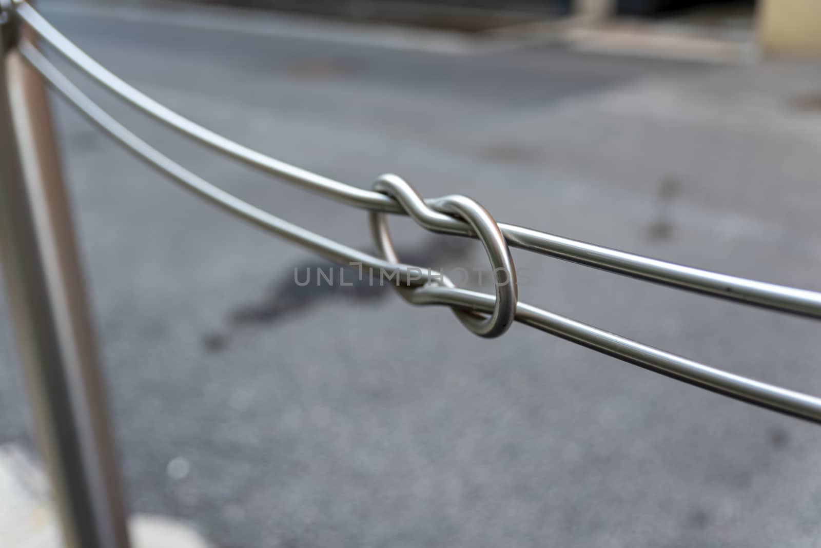 detail of a public iron railing for pedestrians