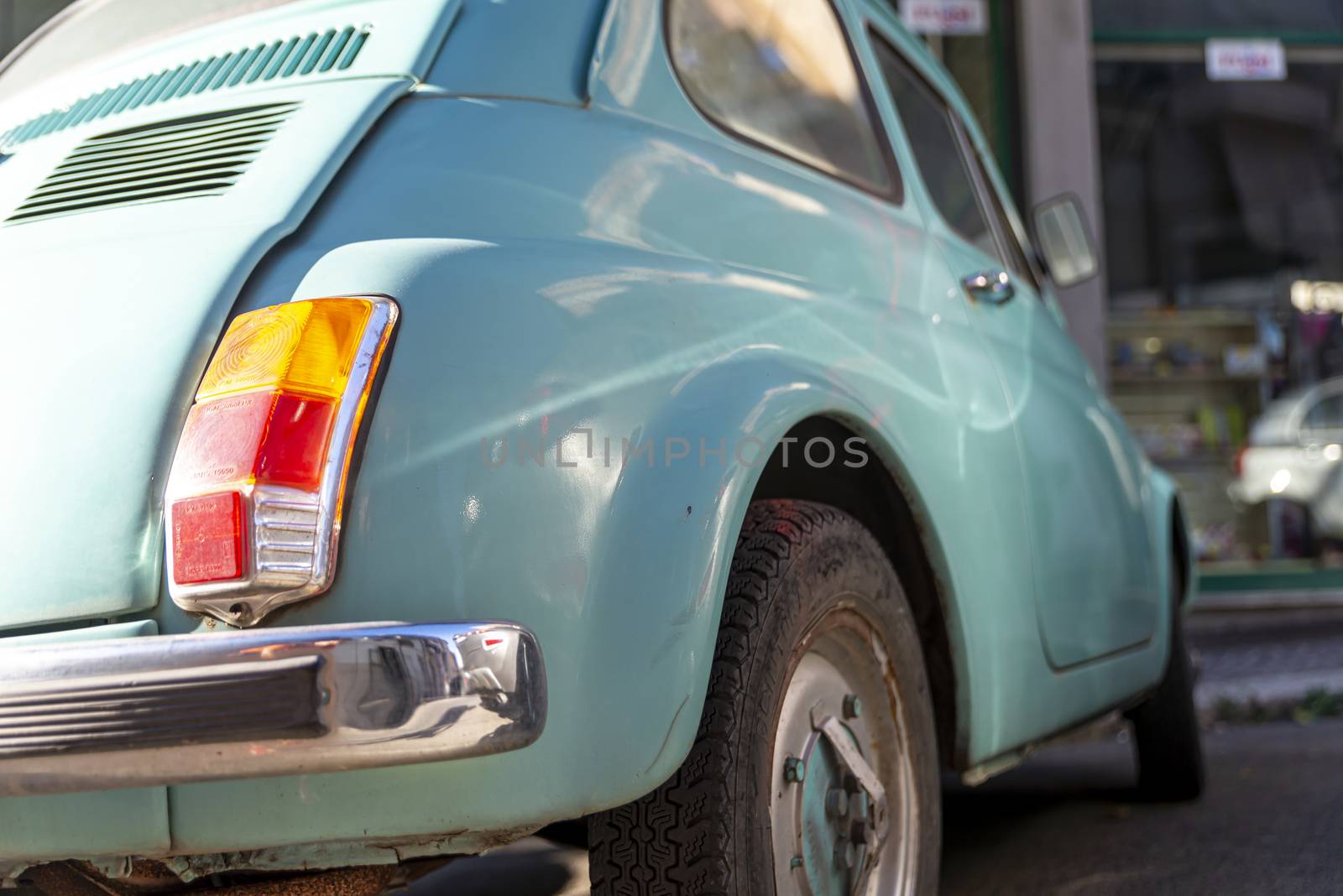 terni,italy august 28 2020:detail of a light blue vintage fiat 500